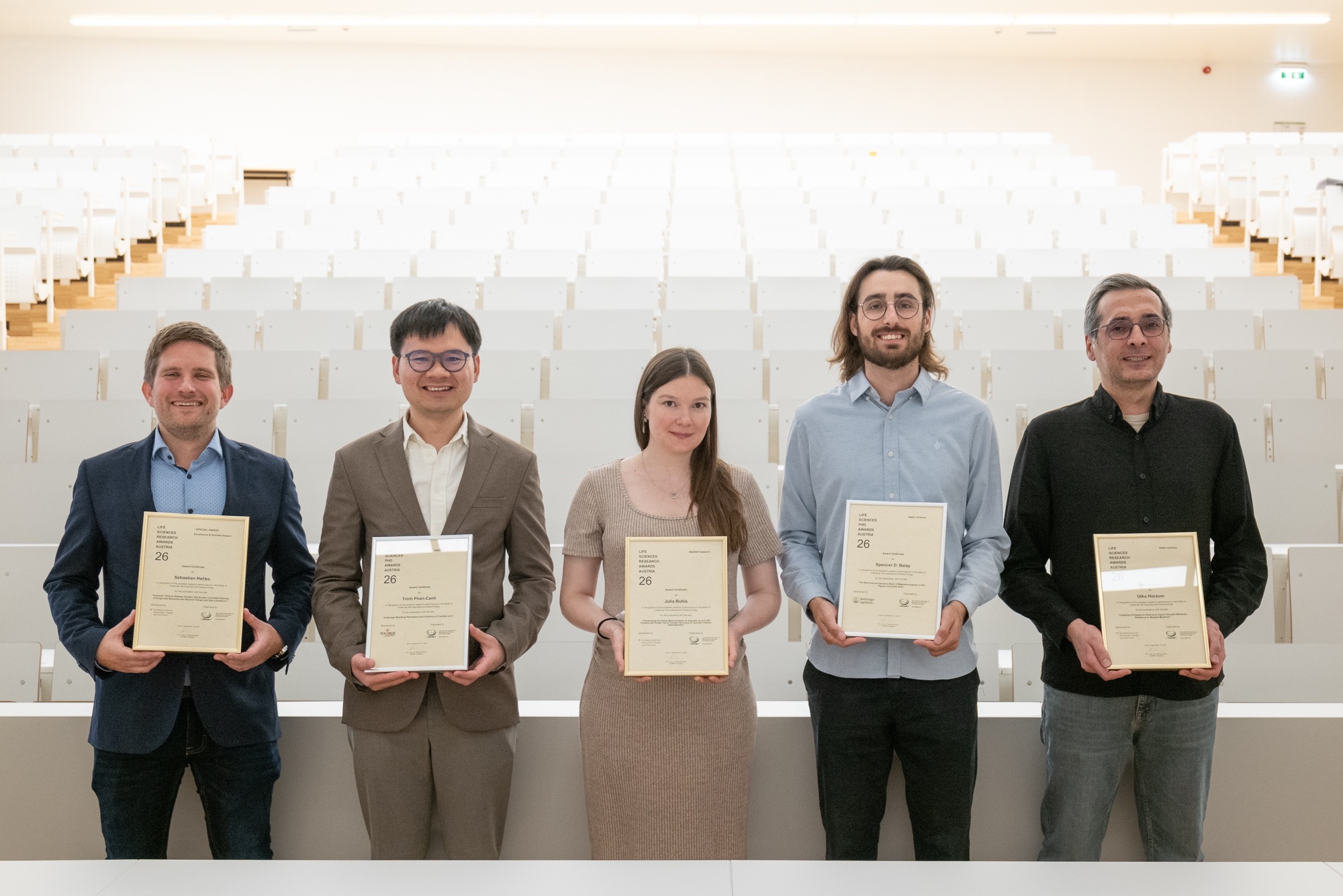 The five Life Sciences Awards Austria 2026 recipients holding their certificates